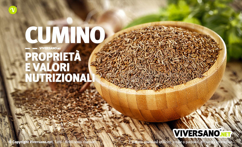 Immagine di semi di cumino posti dentro una ciotola in legno