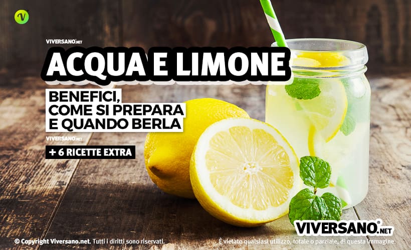 Acqua calda e limone in un bicchiere con cannuccia