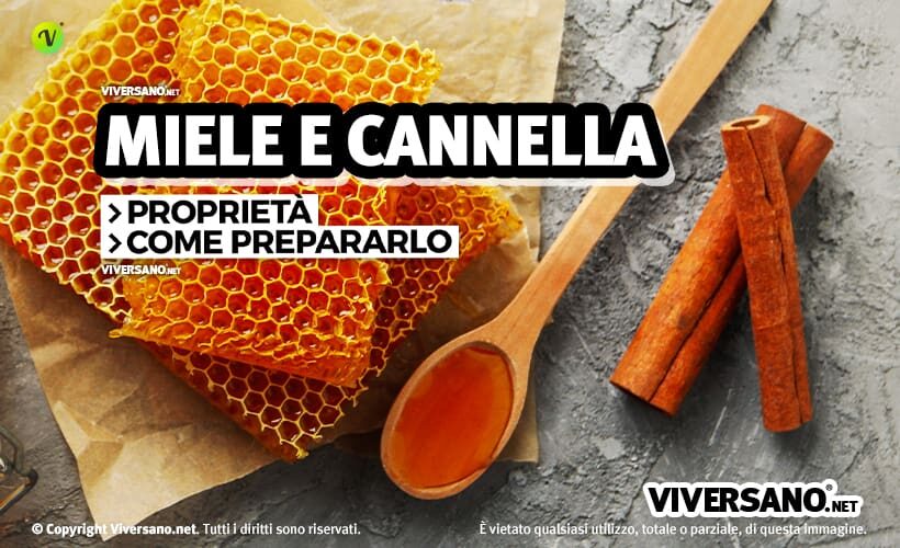 Miele sfuso e stecca di cannella sopra un tavolo