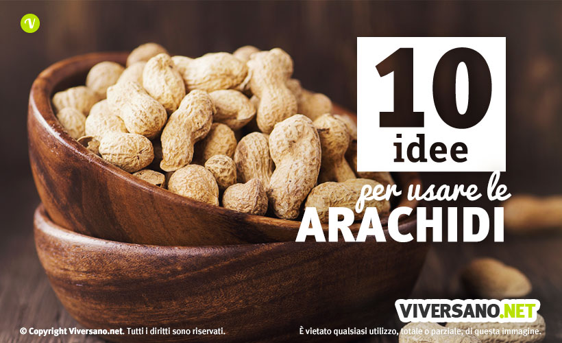 Immagine di arachidi con guscio poste in una ciotola di legno