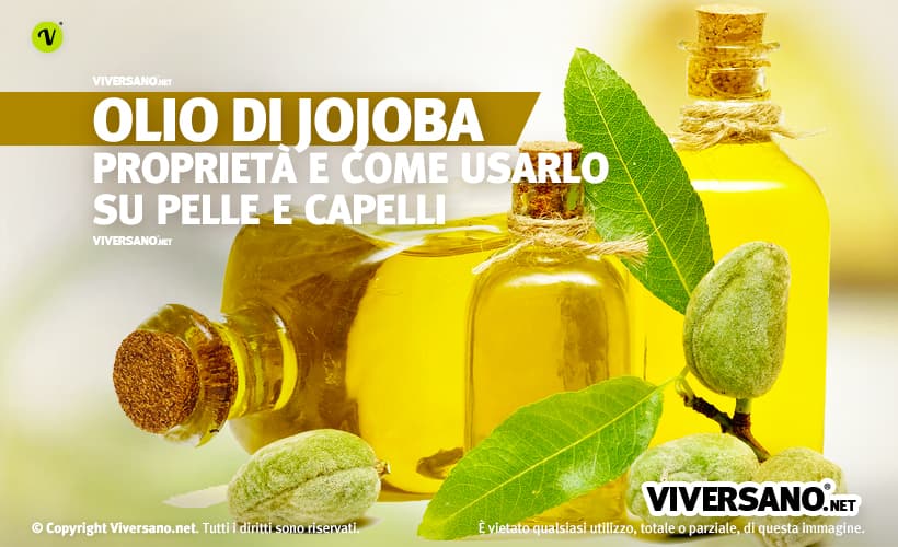 Olio di jojoba in una boccetta di vetro