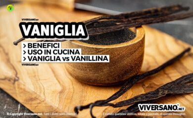 Vaniglia in stecche e in polvere sopra un tagliere